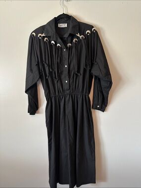 SAS Black Long-Sleeve Fringe Midi Dress with Grommet Detail